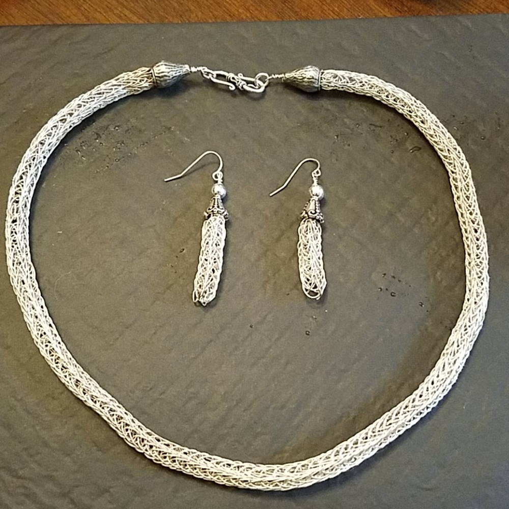 Silver necklace and earrings